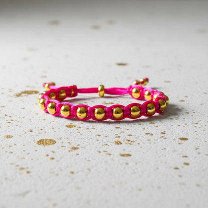 Made by Mothers Luna Aura bracelet with pink satin cord and gold stainless steel beads. Adjustable and waterproof.