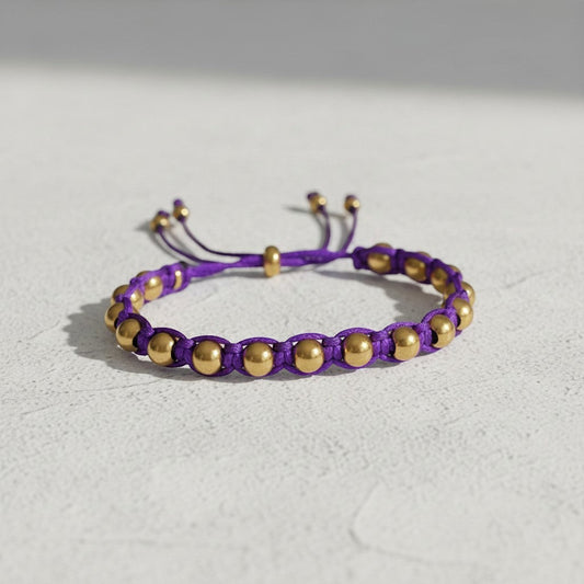 Made by Mothers Luna Aura adjustable bracelet with purple satin cord and gold stainless steel beads. Waterproof.