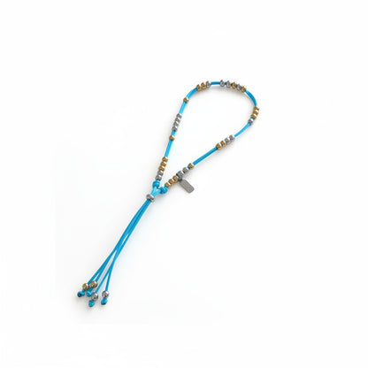Made by Mothers Luna waterproof anklet with blue satin cord and hypoallergenic stainless steel beads