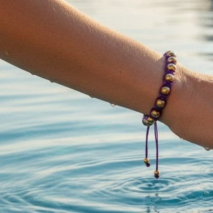 Made by Mothers purple satin cord bracelet with gold stainless steel beads, adjustable.